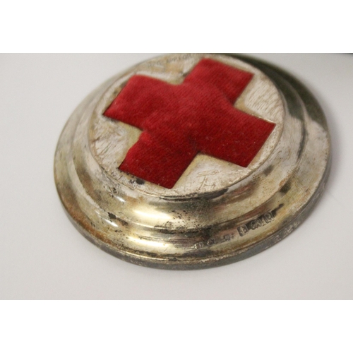 517 - A hallmarked silver Red Cross Pin Cushion, in original box