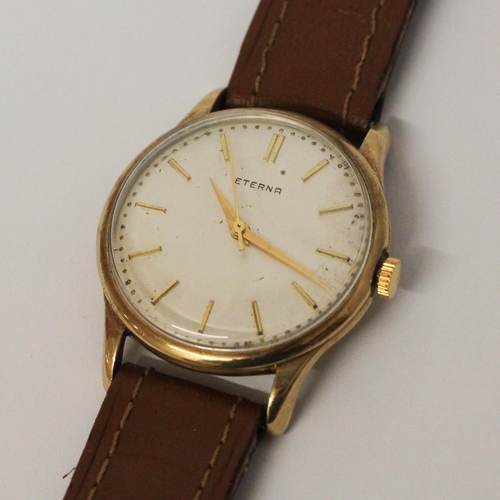 593 - Vintage Eterna gent's 9ct gold cased wristwatch, with case inscribed & dated 1962. On leather strap