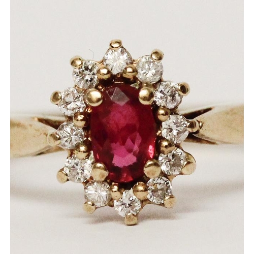 614 - Modern ruby and diamond oval cluster ring on 9ct yellow gold band, ring size M