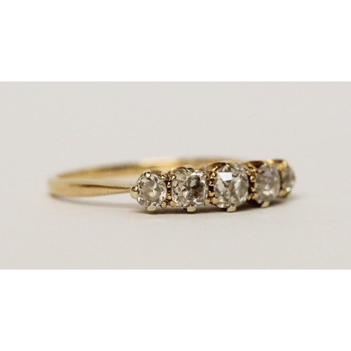 627 - A vintage five stone diamond ring, in 18ct yellow gold band. Ring size P 1/2. Weight 2.7g