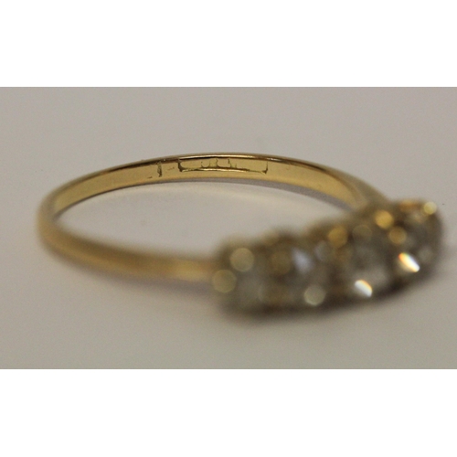 627 - A vintage five stone diamond ring, in 18ct yellow gold band. Ring size P 1/2. Weight 2.7g