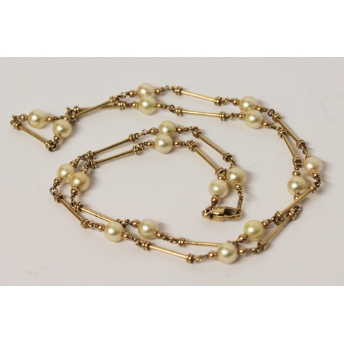 648 - A 9ct yellow gold and cultured pearl necklace, hallmarked, 75cms long approximately.
Gross weight 24... 