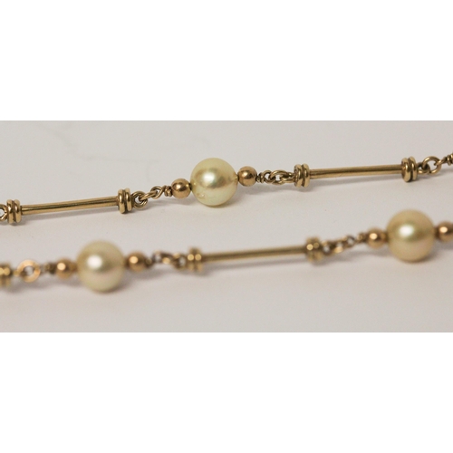 648 - A 9ct yellow gold and cultured pearl necklace, hallmarked, 75cms long approximately.
Gross weight 24... 