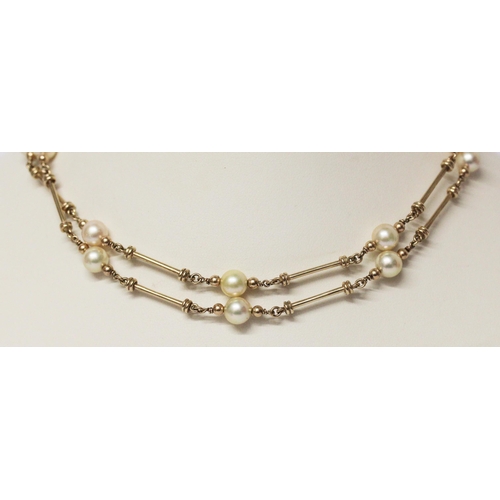 648 - A 9ct yellow gold and cultured pearl necklace, hallmarked, 75cms long approximately.
Gross weight 24... 