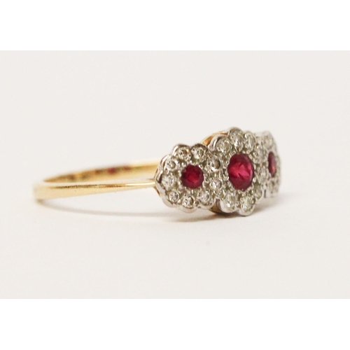 650 - Edwardian ruby and diamond triple cluster ring, designed as three flower shaped clusters, on 18ct go... 