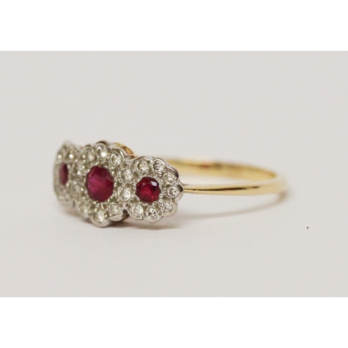 650 - Edwardian ruby and diamond triple cluster ring, designed as three flower shaped clusters, on 18ct go... 