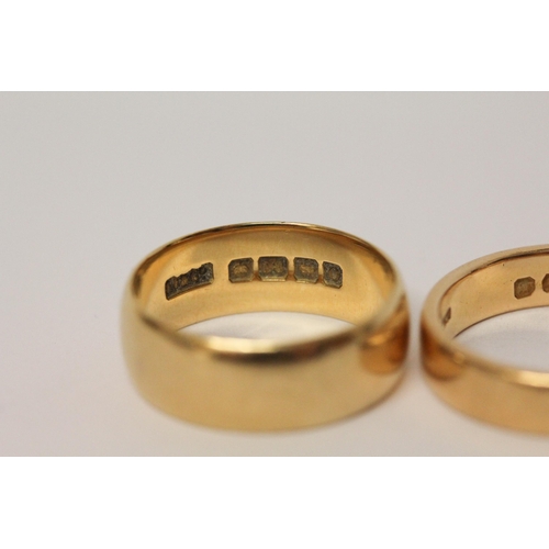 661 - Two 18ct yellow gold wedding bands, 14.4 grams. Ring size wider band P, narrower band S.