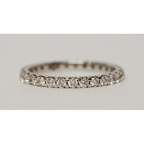 667 - Modern diamond full eternity ring, 18ct white gold with 1 carat diamond weight marked in shank. Ring... 