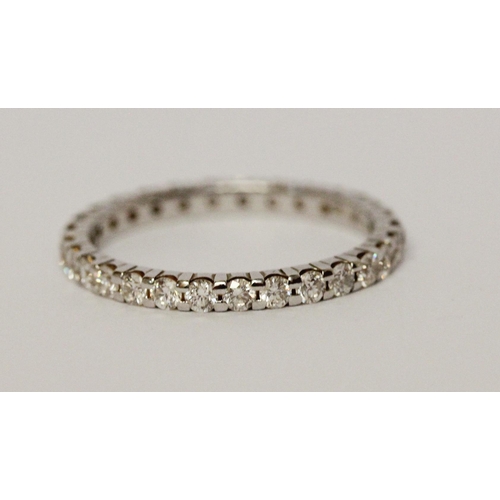 667 - Modern diamond full eternity ring, 18ct white gold with 1 carat diamond weight marked in shank. Ring... 