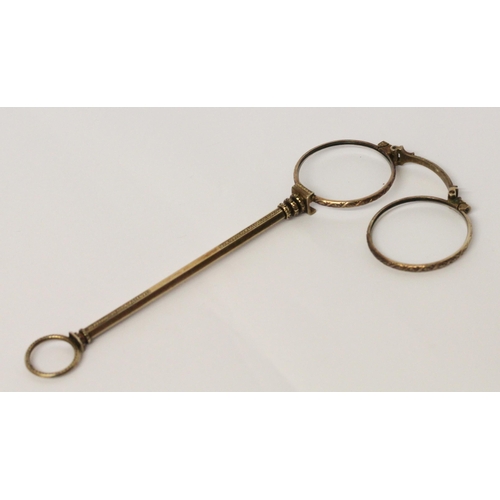 671 - A Victorian gilt metal lorgnette