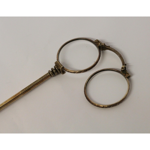 671 - A Victorian gilt metal lorgnette