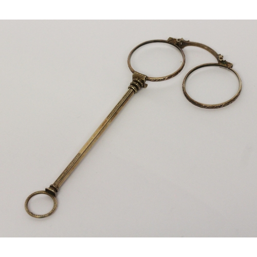 671 - A Victorian gilt metal lorgnette