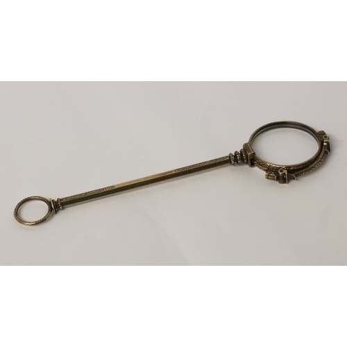 671 - A Victorian gilt metal lorgnette