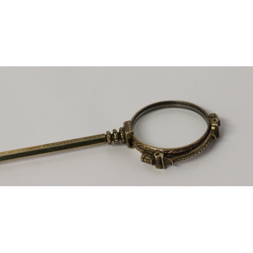 671 - A Victorian gilt metal lorgnette