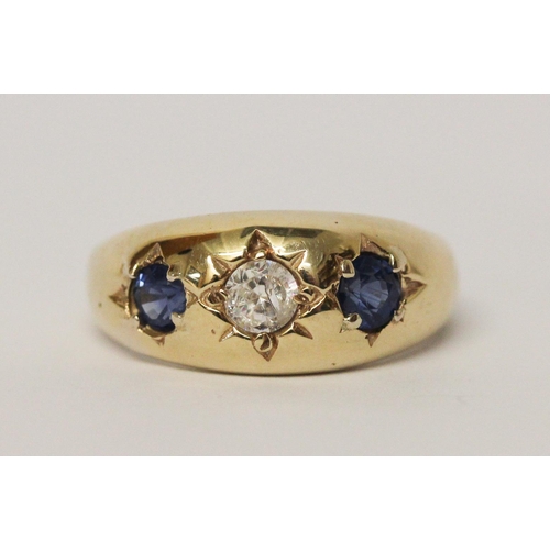 679 - A sapphire set gypsy ring, in 9ct yellow gold, unmarked, ring size T, weight 4.6g