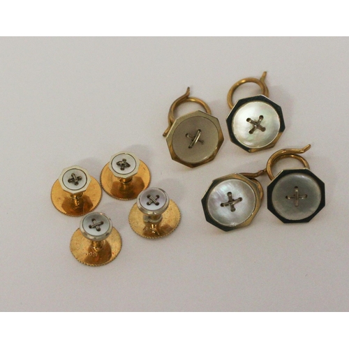 682 - Two cased 18ct gold gentleman's shirt studs sets, both set with mother of pearl button motifs.