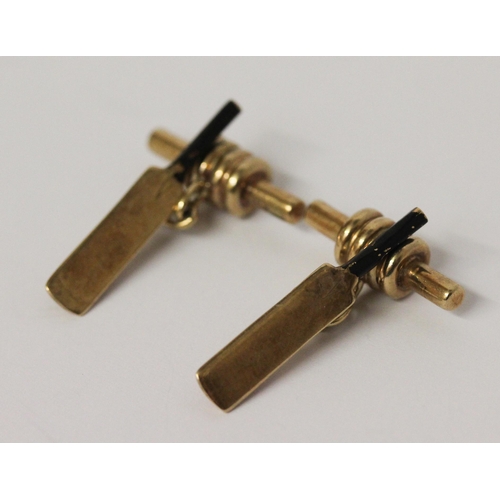 683 - Cricketing interest - a pair of gents yellow gold and black enamel cricket bat & bail cufflinks. Unm... 