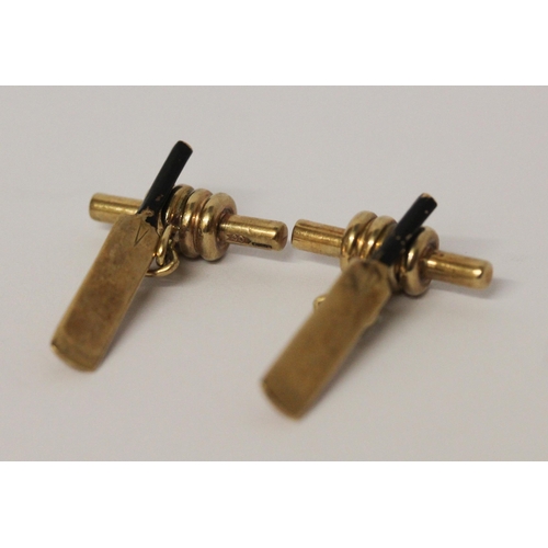 683 - Cricketing interest - a pair of gents yellow gold and black enamel cricket bat & bail cufflinks. Unm... 