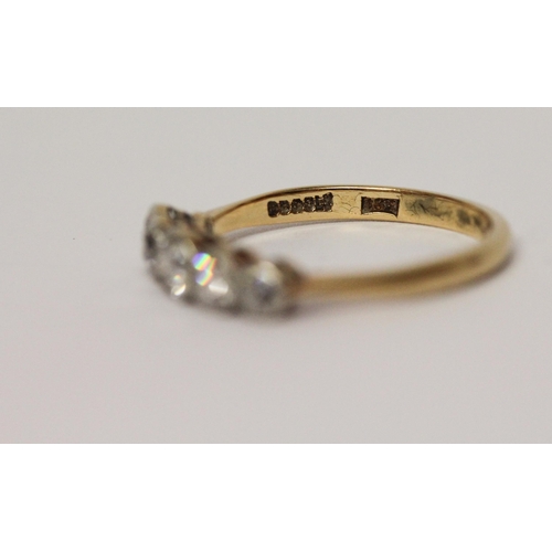 686 - An Edwardian five stone diamond ring, the graduated brilliant cut diamonds in millegrain settings, o... 