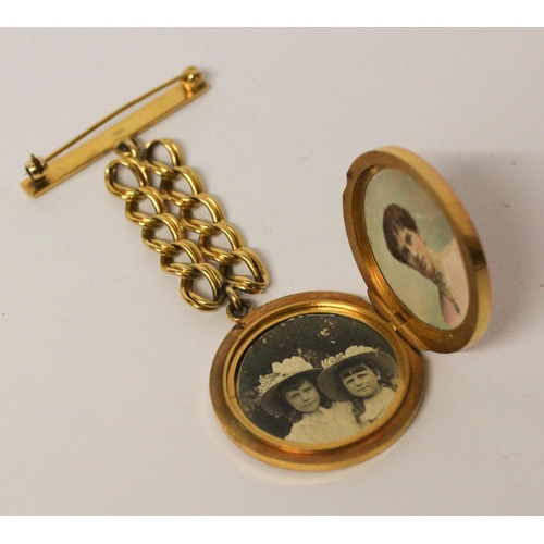 688 - Victorian 9ct yellow gold fob mounted circular mourning locket, the hinged locket set with original ... 