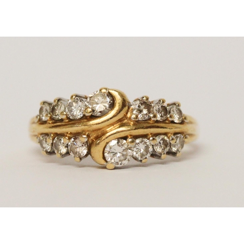 723 - A diamond dress ring, set two rows of brilliant cut diamonds on 18ct yellow gold band, hallmarked ri... 