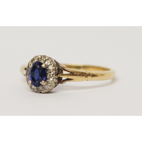 725 - Vintage sapphire and diamond oval cluster ring, on 18ct yellow gold band. Ring size N weight 2.6g