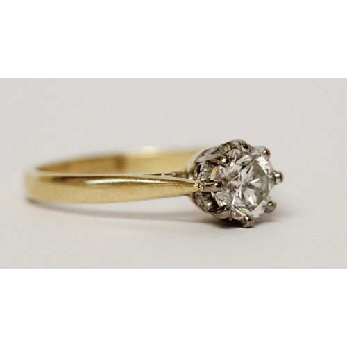 730 - A solitaire diamond engagement ring, set with a circular claw set brilliant cut diamond weighing 75 ... 