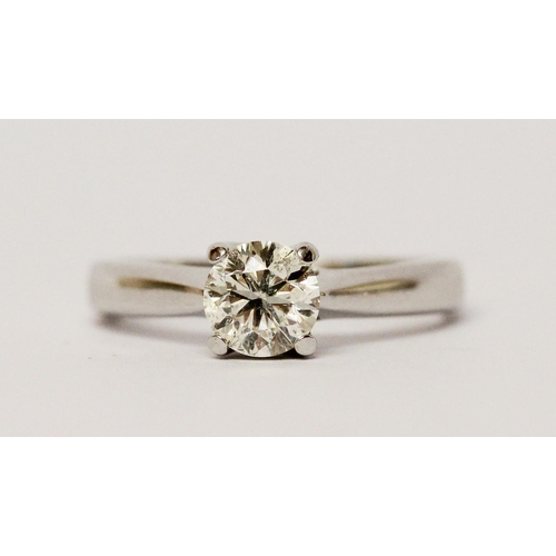 732 - A Diamond engagement ring, solitaire brilliant cut diamond weighing 95 points within simple claw set... 