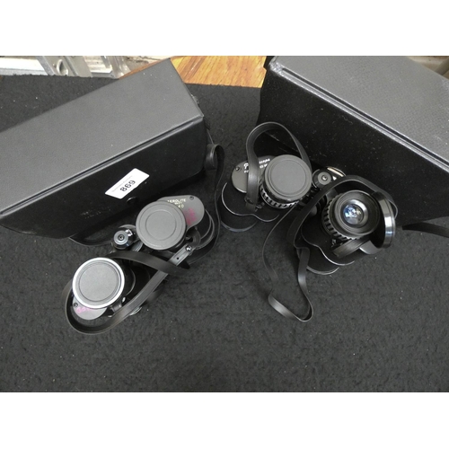 869 - Two pairs of binoculars in carrying case