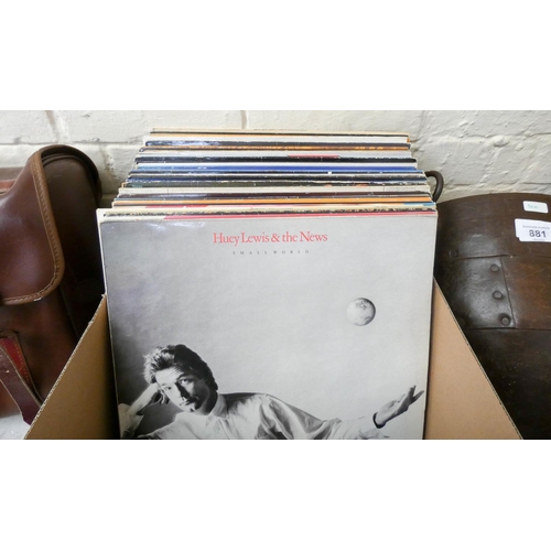 880 - A quantity of vinyl LP records including Elvis, Chris Rea, Rod Stewart, Beach Boys, Eddie Cochran, B... 