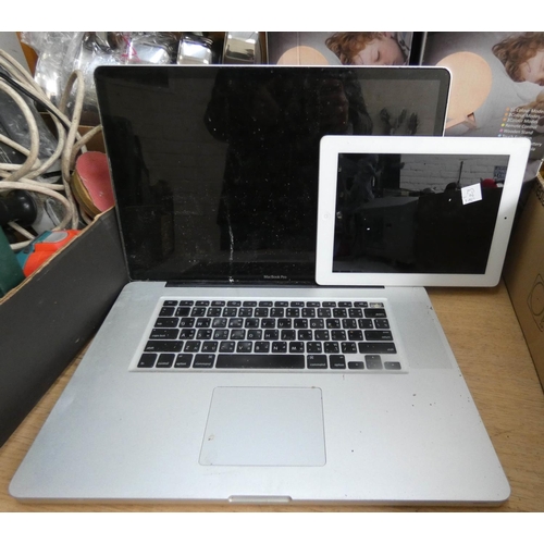 923 - An Apple laptop and an Apple IPad, no power packs - as found