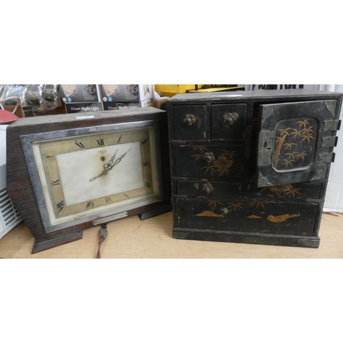 926 - Old electric clock and oriental multi-drawer miniature cabinet