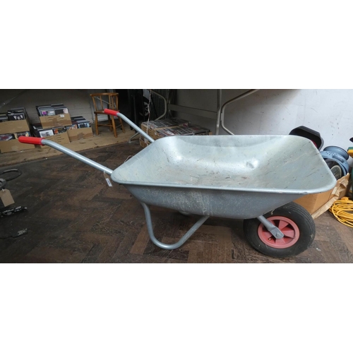 932 - A metal garden wheelbarrow