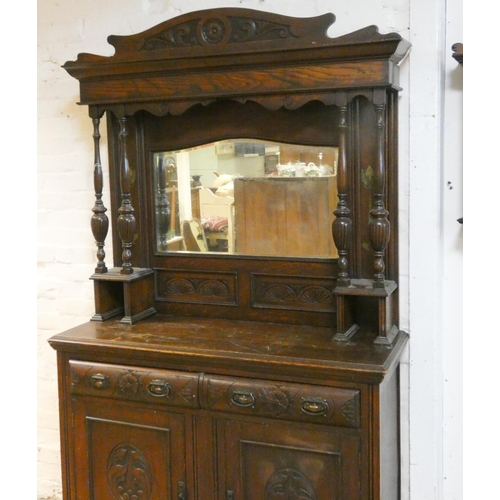 380 - Art Nouveau oak sideboard with mirror back, carved drawer fronts and panels to doors, 4' wide