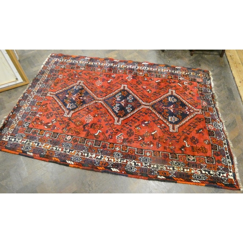 412 - Large Persian design red & patterned wool rug, 8' x 5'6