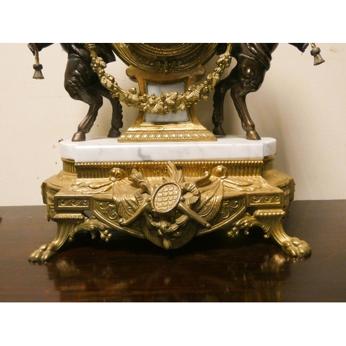 424 - Franz Hermle - An Italian gilt figure mounted striking mantel clock on marble base, movement marked ... 