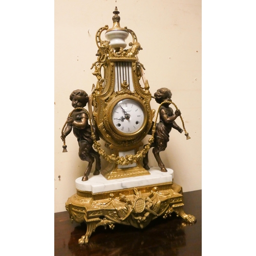 424 - Franz Hermle - An Italian gilt figure mounted striking mantel clock on marble base, movement marked ... 