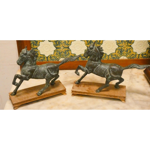 427 - Pair of Chinese bronze horses on wooden bases, 9