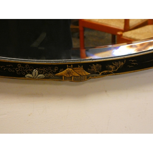 433 - A 1920's Chinoiserie framed oval wall mirror. Approx 31 ½” widest point to point and 16 ½” top to bo... 