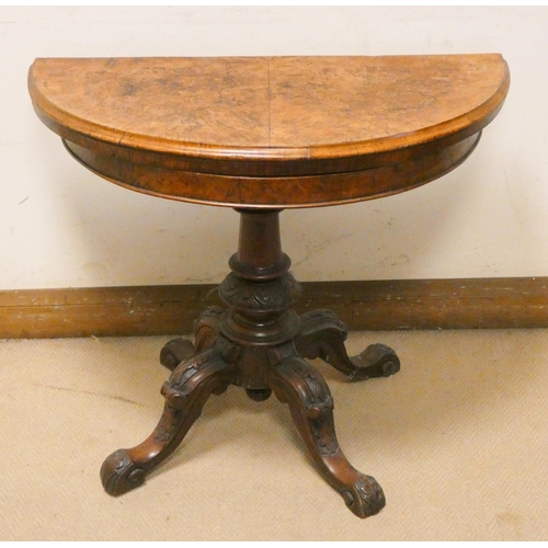 452 - Victorian semi-circular walnut folding top card table on turned pillar and quadruple base, 3' wide