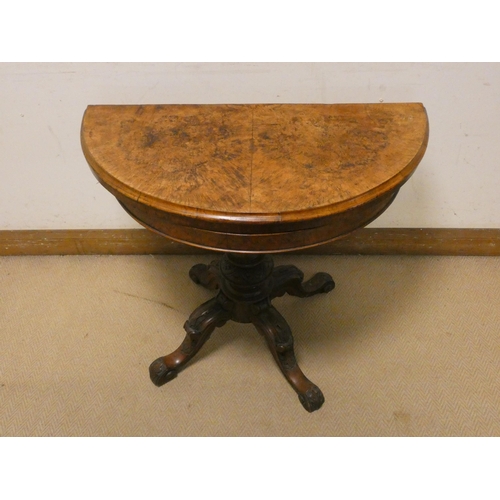 452 - Victorian semi-circular walnut folding top card table on turned pillar and quadruple base, 3' wide