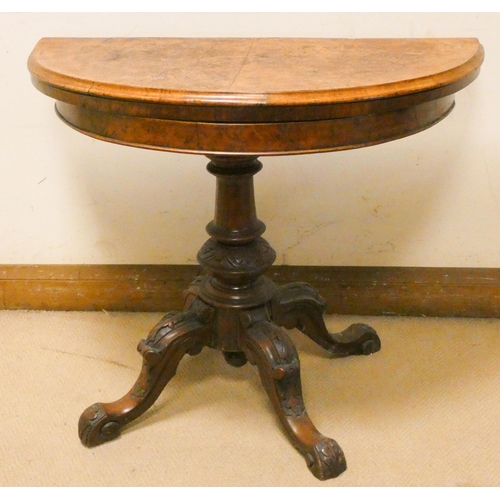 452 - Victorian semi-circular walnut folding top card table on turned pillar and quadruple base, 3' wide