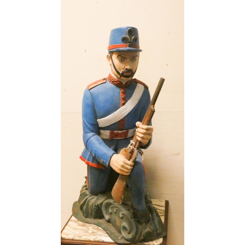 454 - Decorative figure of a kneeling Foreign Legion soldier, 28.5