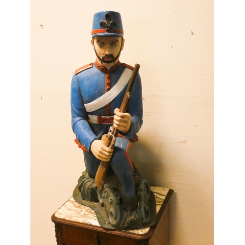 454 - Decorative figure of a kneeling Foreign Legion soldier, 28.5