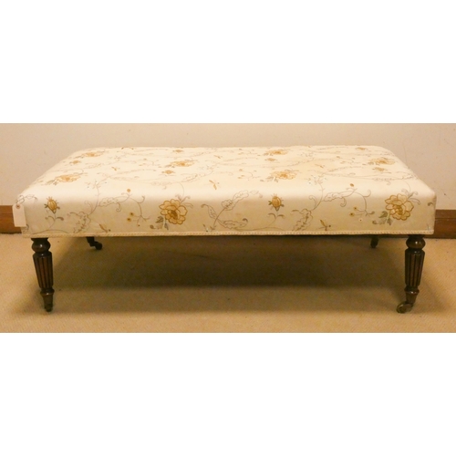 456 - Large early 20th century upholstered footstool on mahogany reeded legs, 4' x 2'