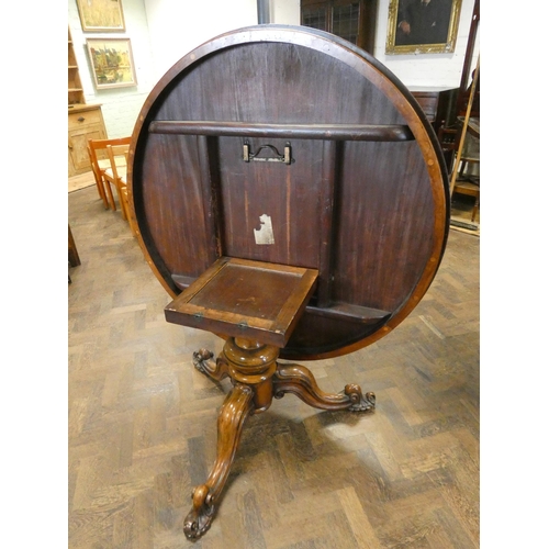 467 - Victorian figured walnut circular walnut snap top breakfast table on pillar and tripod base, 49