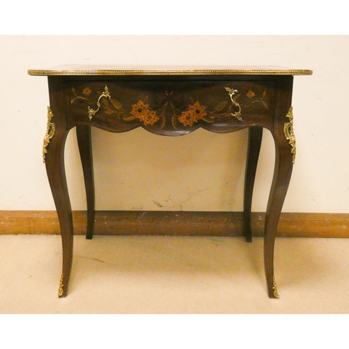 474 - French floral marquetry decorated shaped top writing table, with drawer, gilt metal mounts on cabrio... 