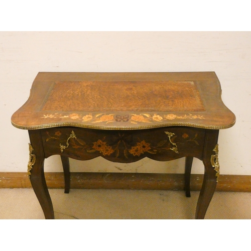 474 - French floral marquetry decorated shaped top writing table, with drawer, gilt metal mounts on cabrio... 