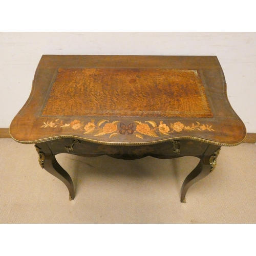 474 - French floral marquetry decorated shaped top writing table, with drawer, gilt metal mounts on cabrio... 