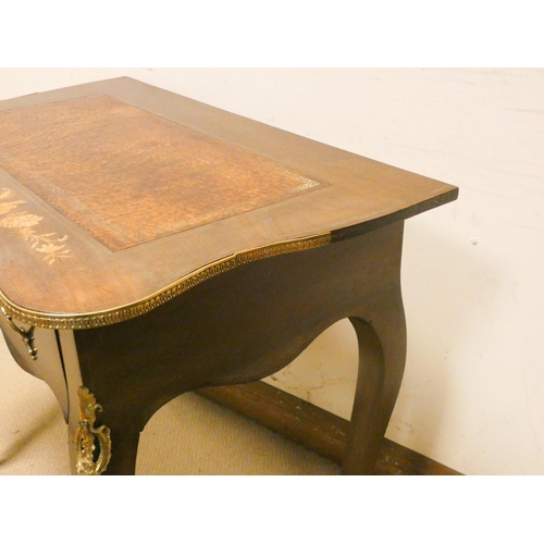 474 - French floral marquetry decorated shaped top writing table, with drawer, gilt metal mounts on cabrio... 